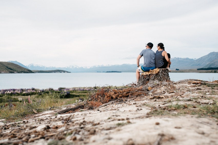 Sitting on the lakeside of Lake Tekapo