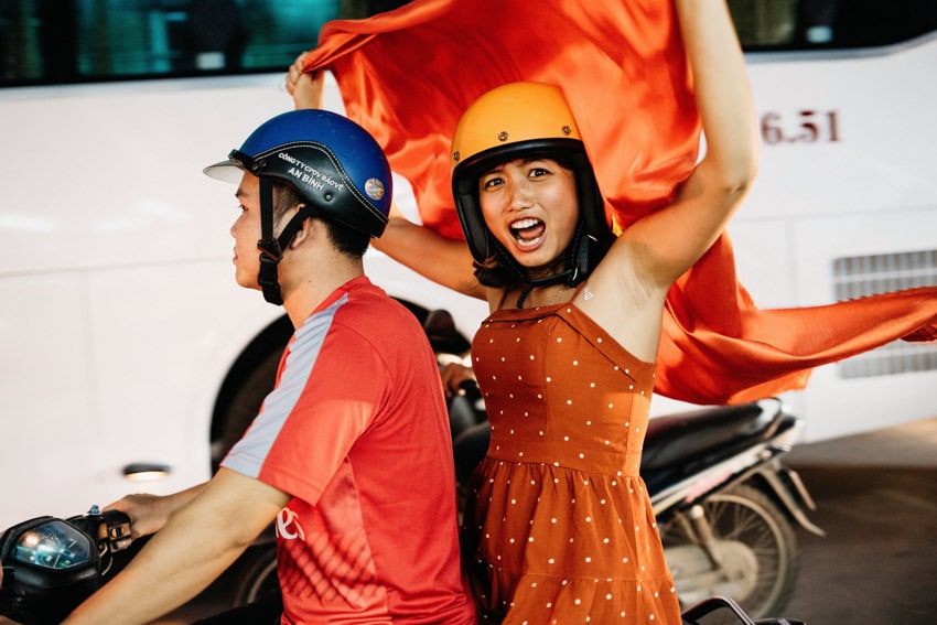 Vietnam Celebration on Scooter Girl on Bike