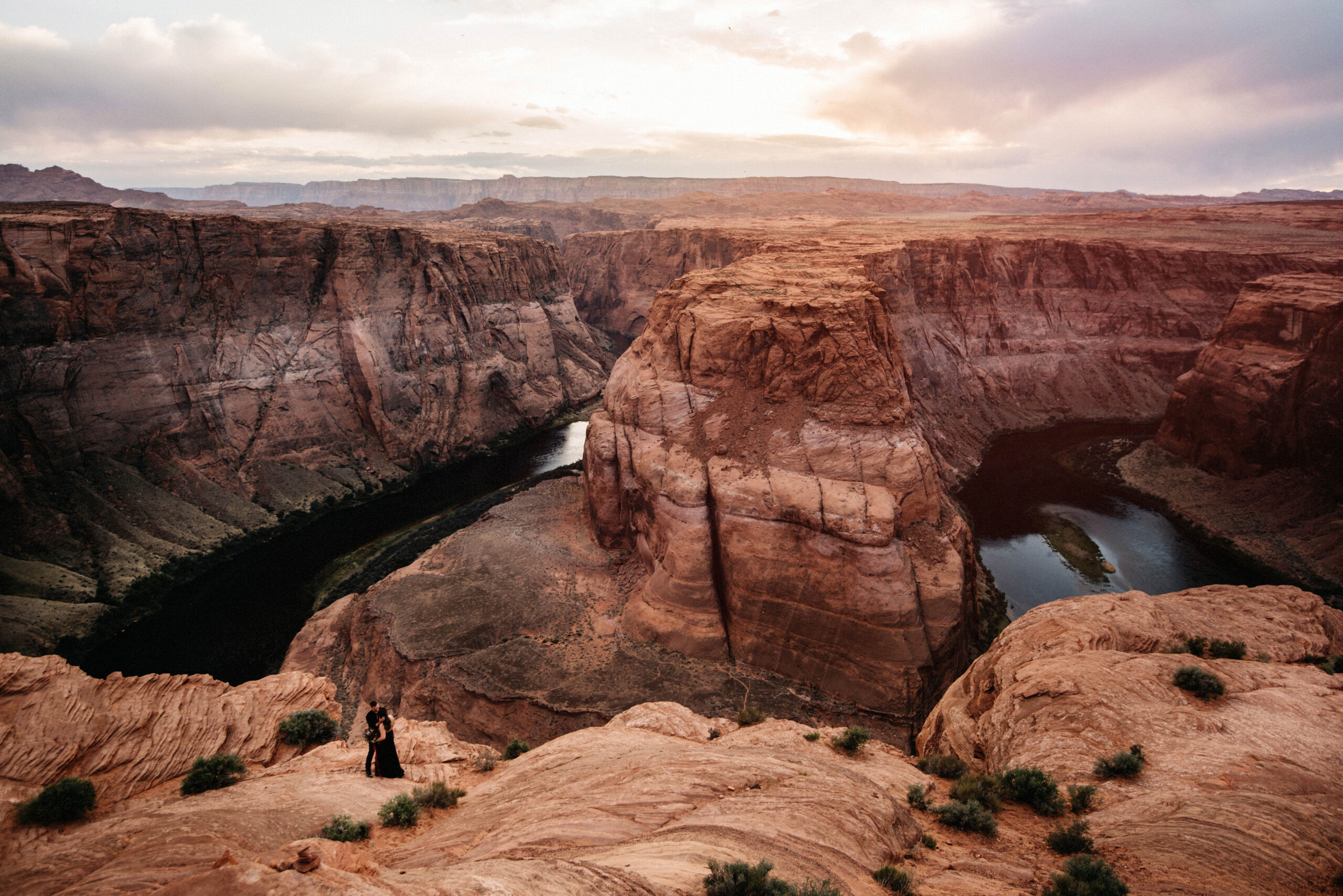 Visitors gathered along the edge at Horseshoe Bend