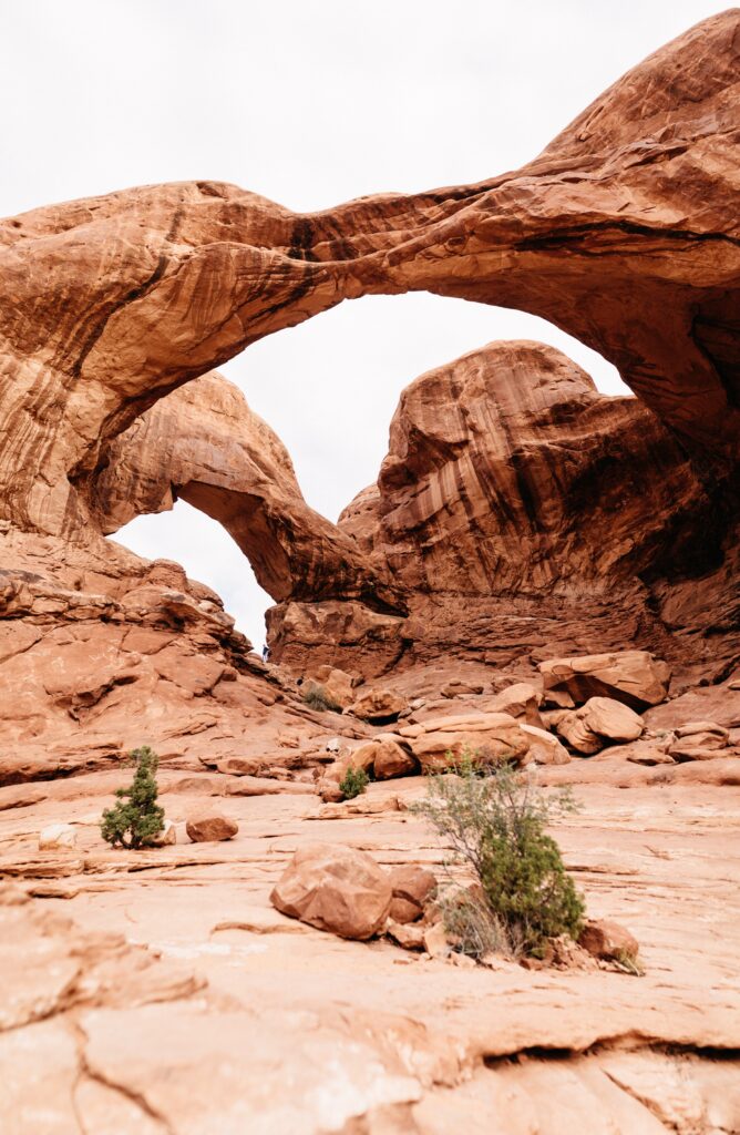 Double Arch rising above the red sandstone in Arches National Park