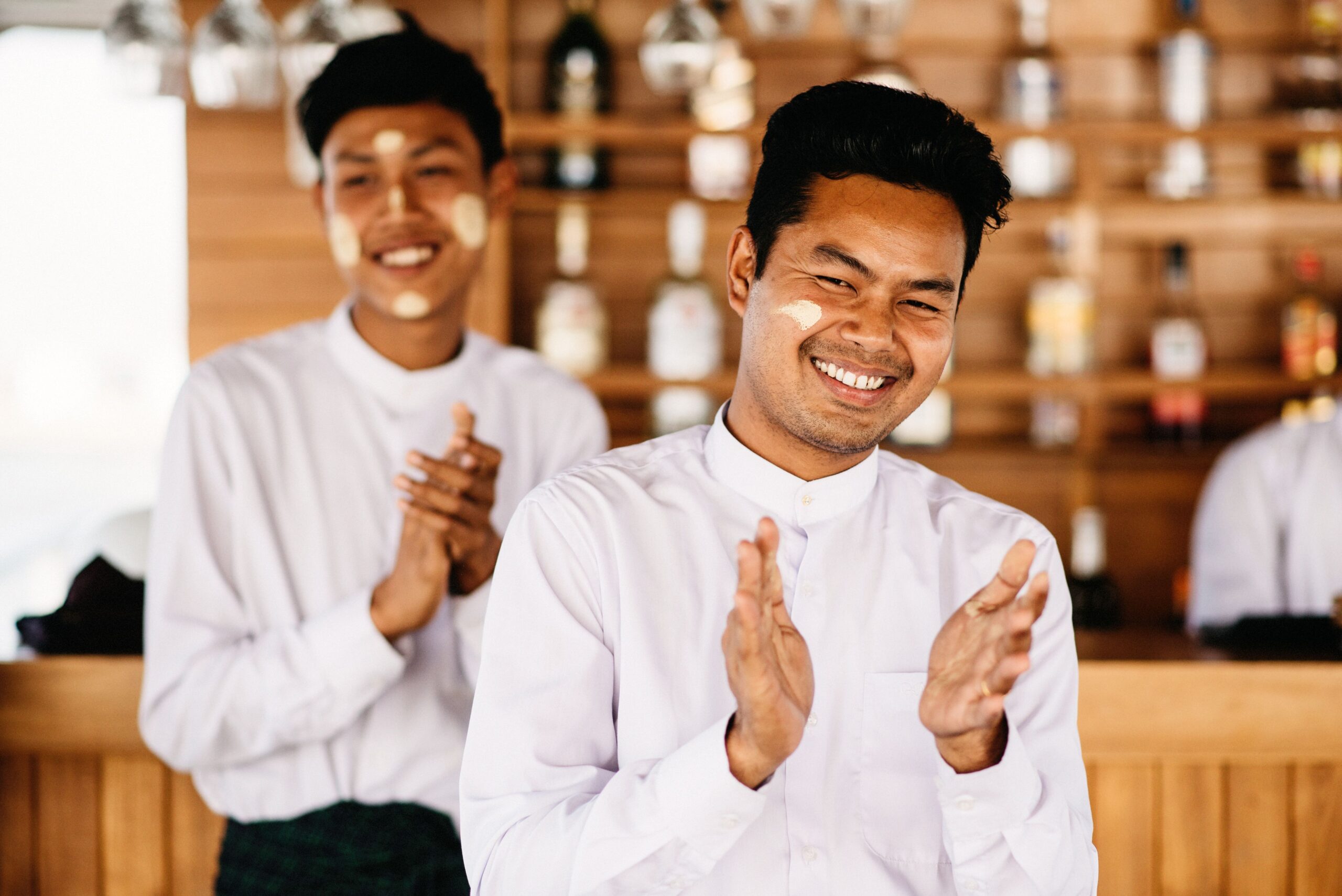 Two smiling crew members aboard the RV Panorama