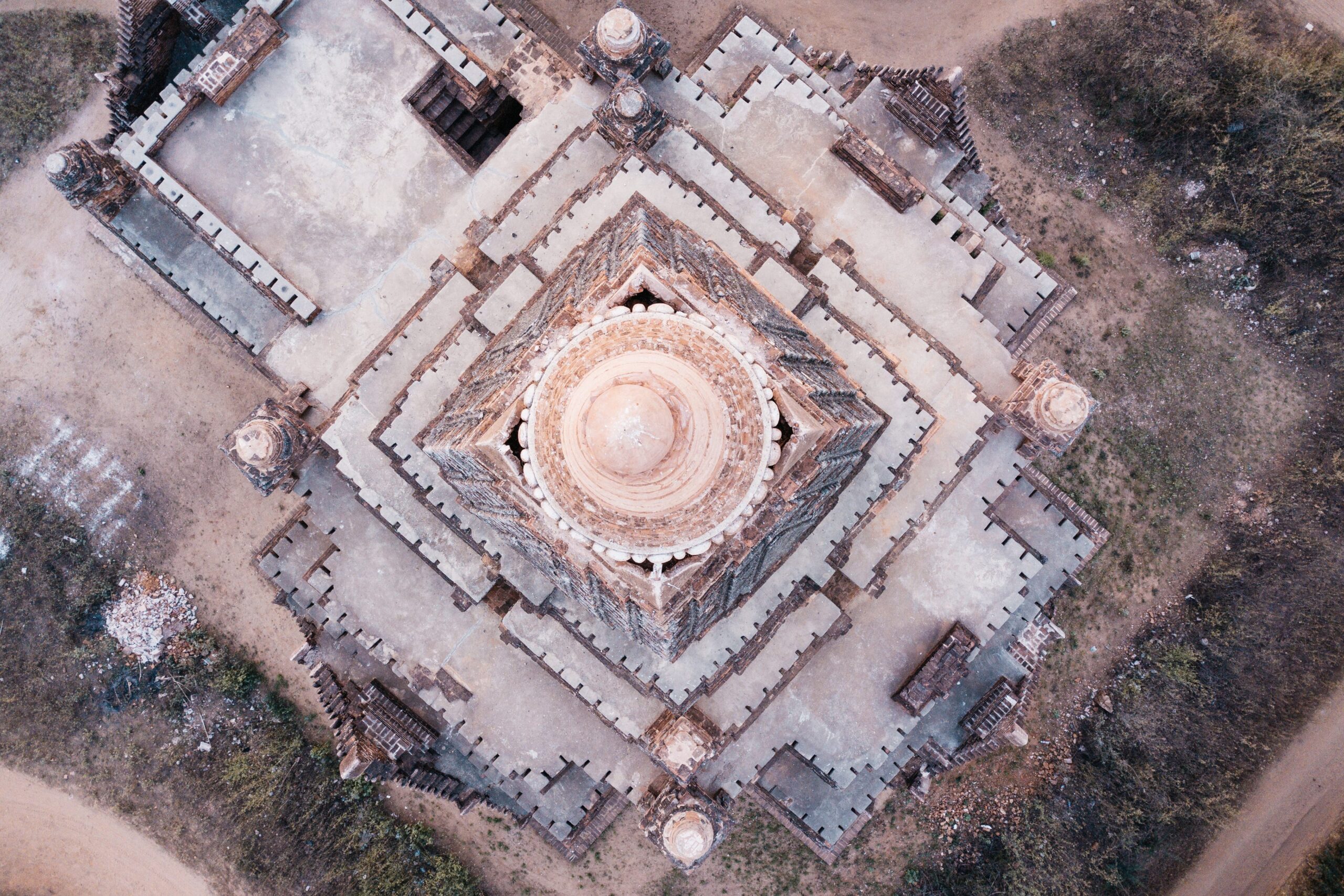 Aerial view straight down onto a pagoda in the Bagan Archaeological Zone