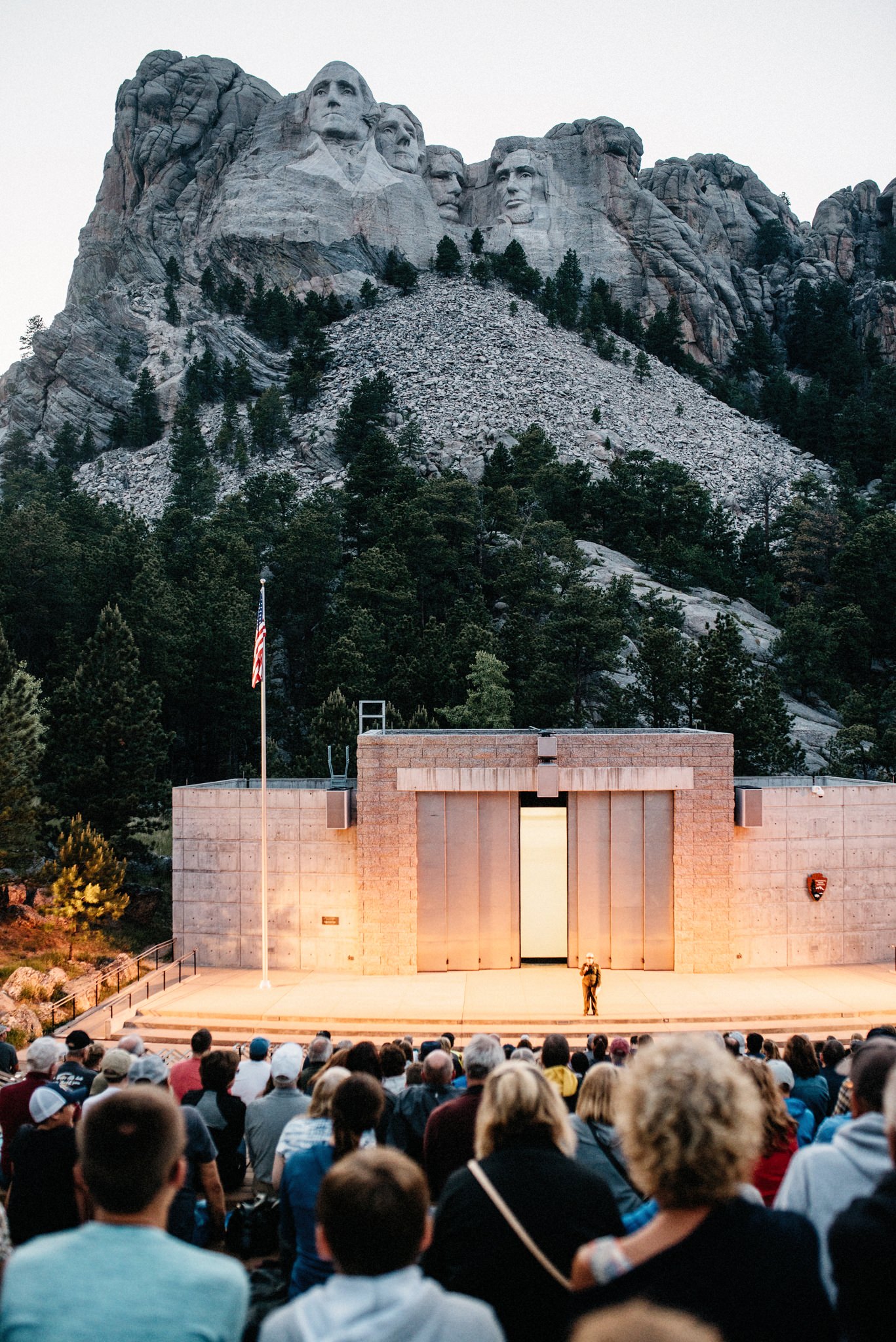 The amphitheatre building below Mount Rushmore after dark