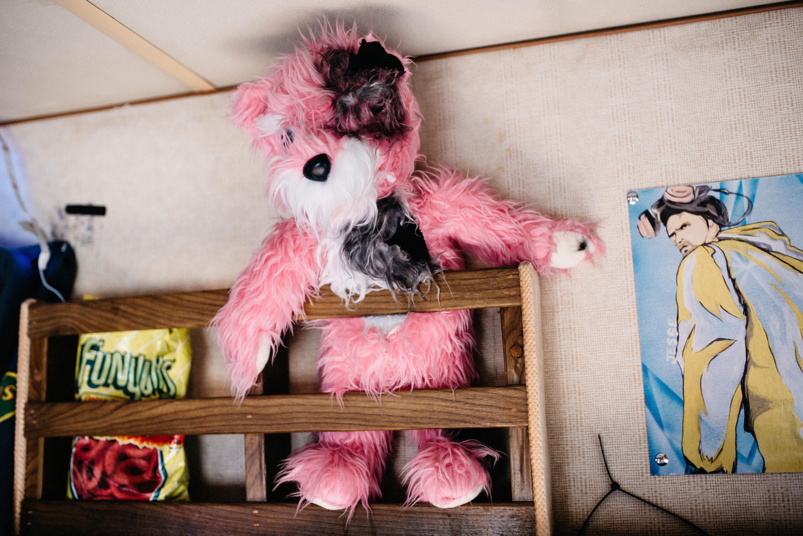The pink teddy bear and other Breaking Bad props inside the tour RV