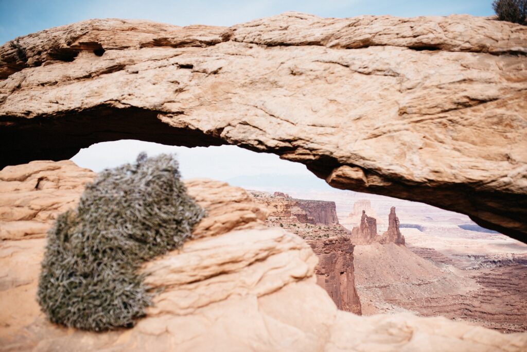 Mesa Arch framing the canyons below Island in the Sky