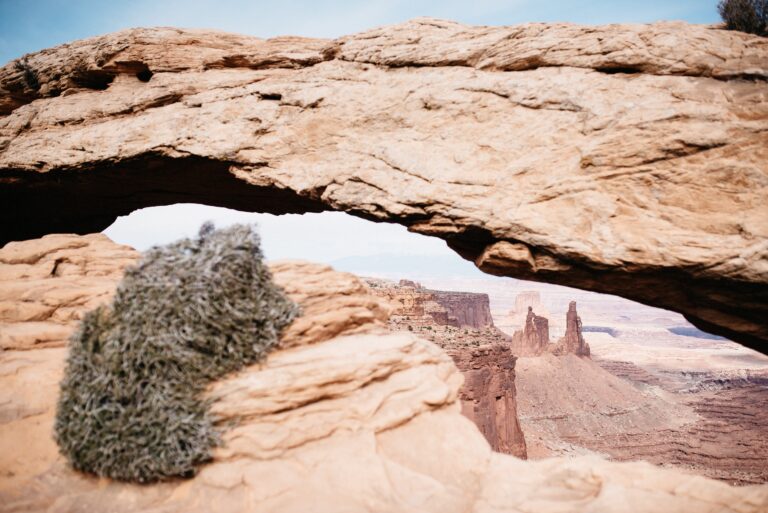 Mesa Arch framing the canyons below Island in the Sky