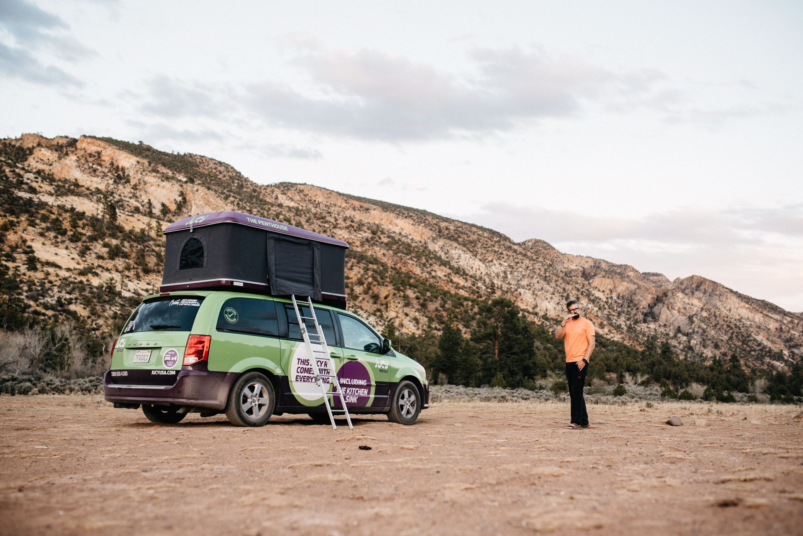 Our green camper van parked outside Capitol Reef