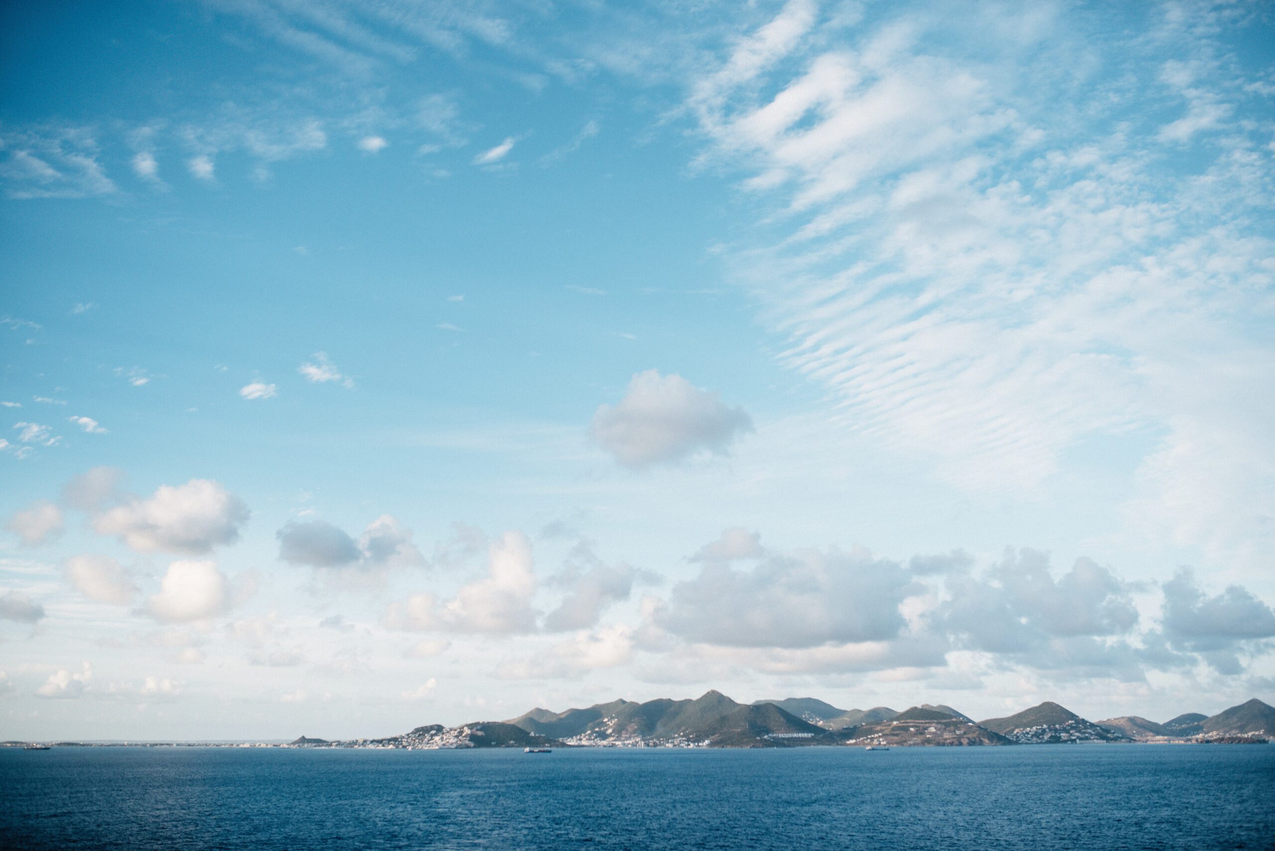 The green volcanic coast of St Kitts seen from the sea