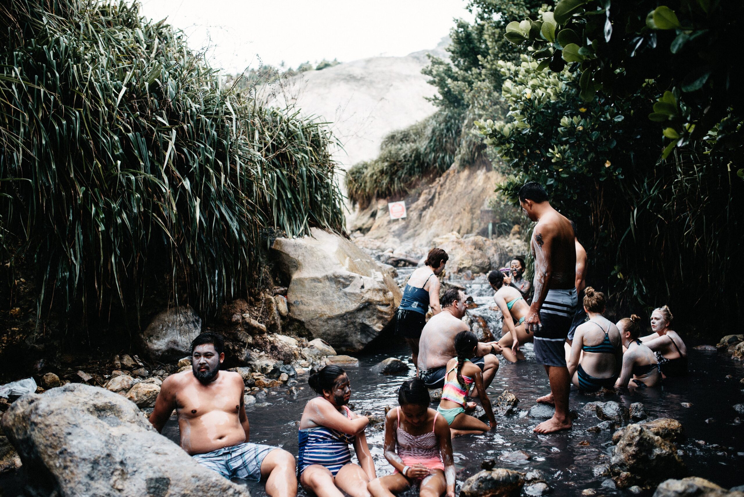 Visitors bathing in volcanic mud near Soufriere in St Lucia
