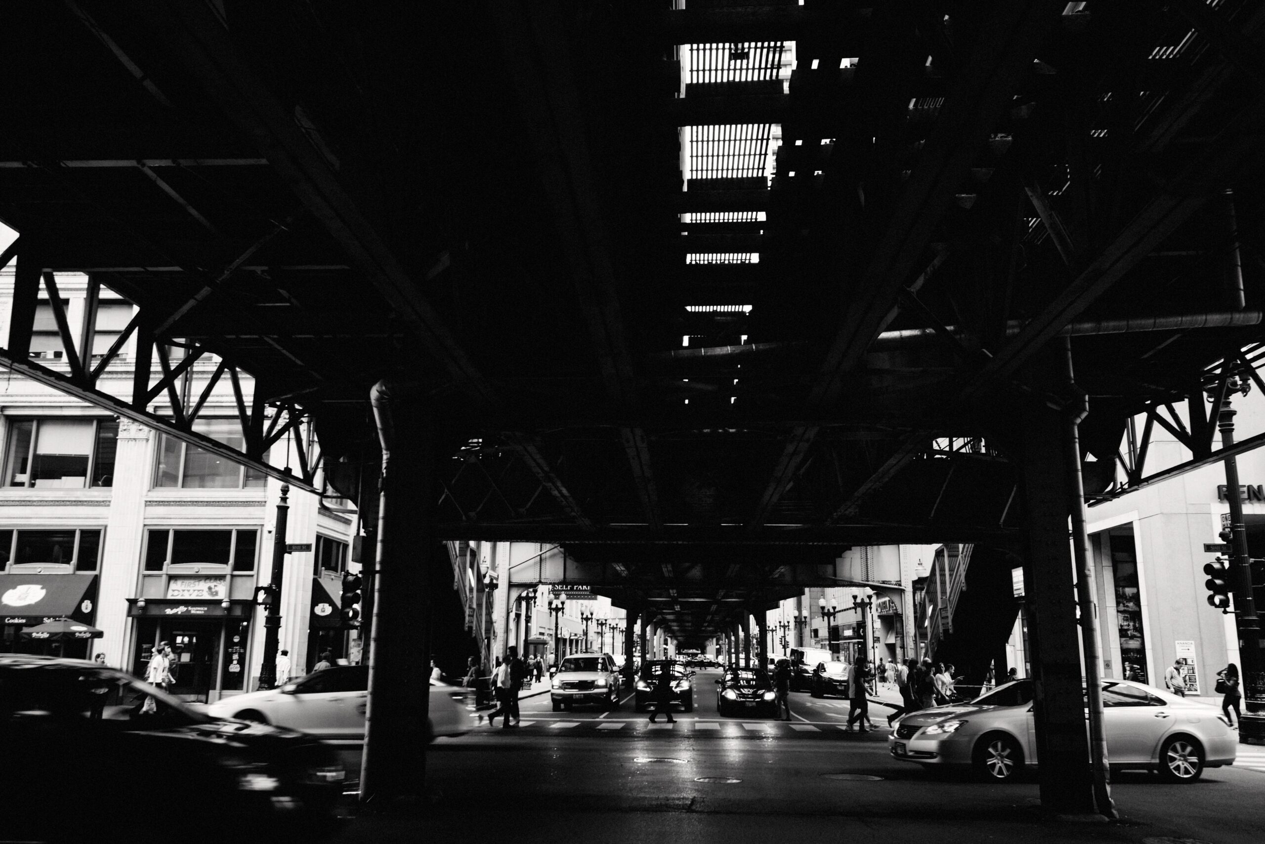 A Chicago street beneath the elevated railway tracks