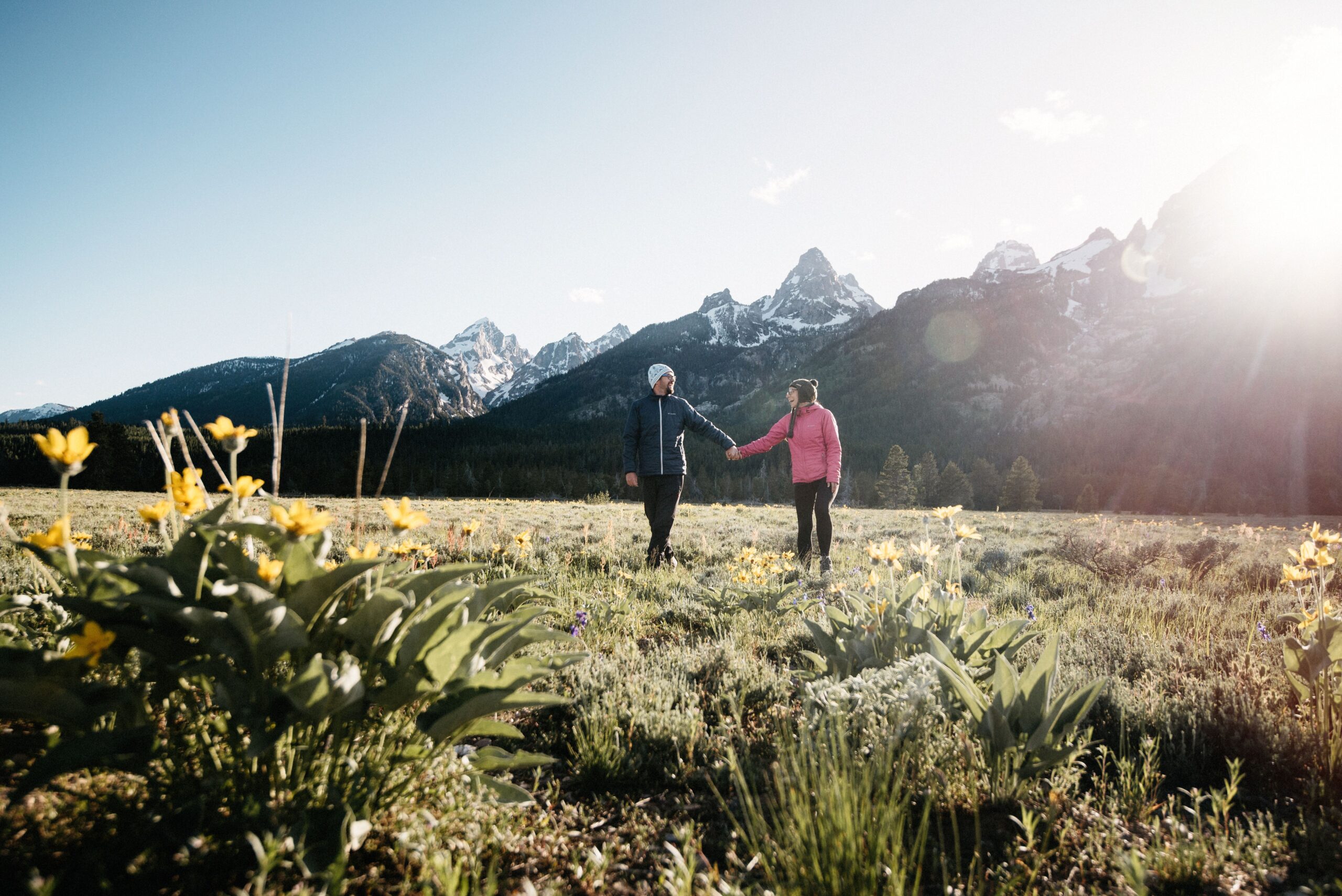 Bianca and Tom below the mountain panorama in Grand Teton