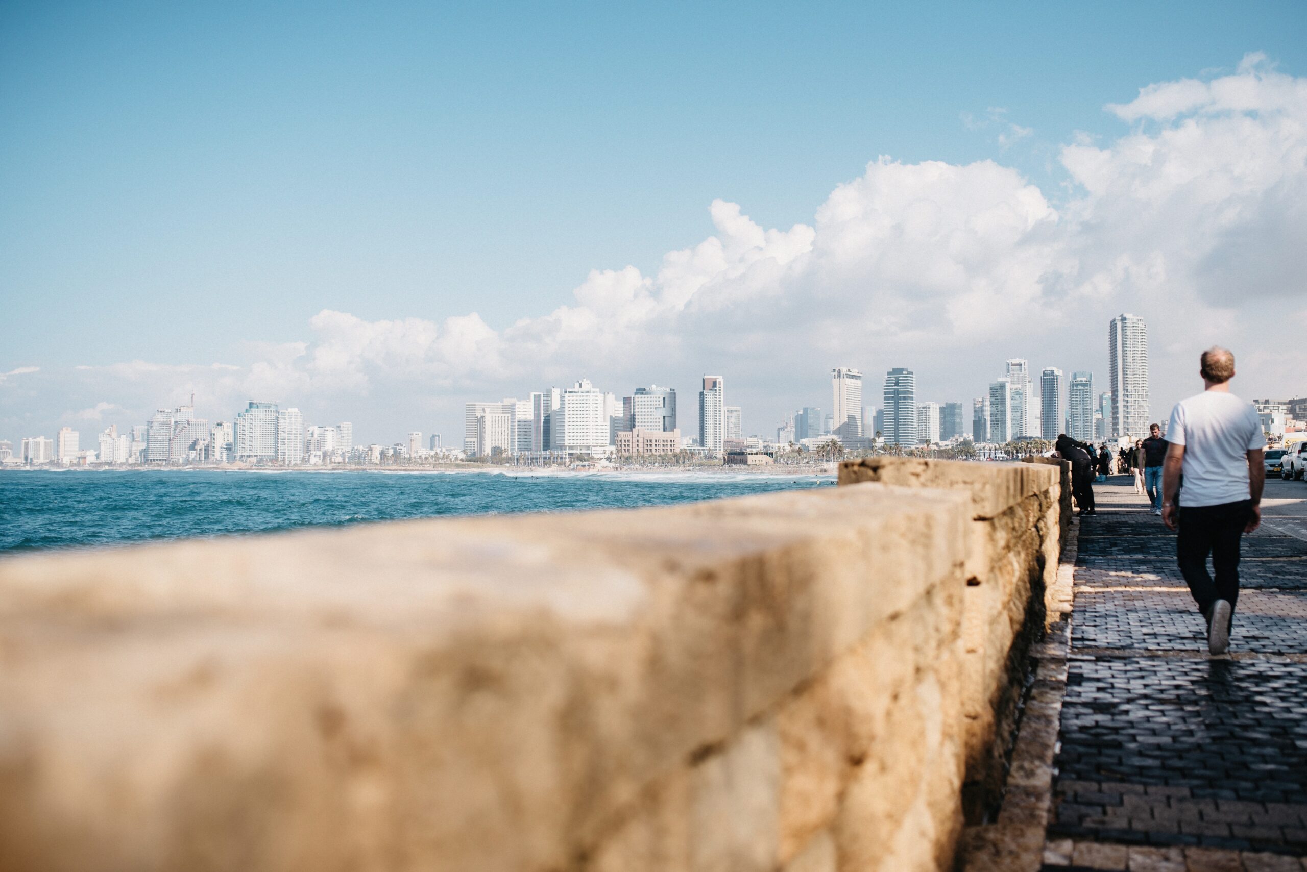 The Tel Aviv skyline seen from the old stone waterfront in Jaffa