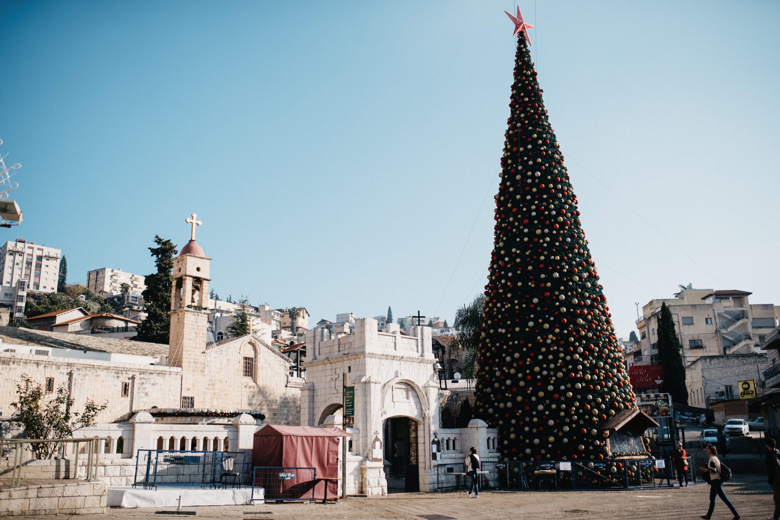 A Christmas tree and church in Nazareth during the festive season