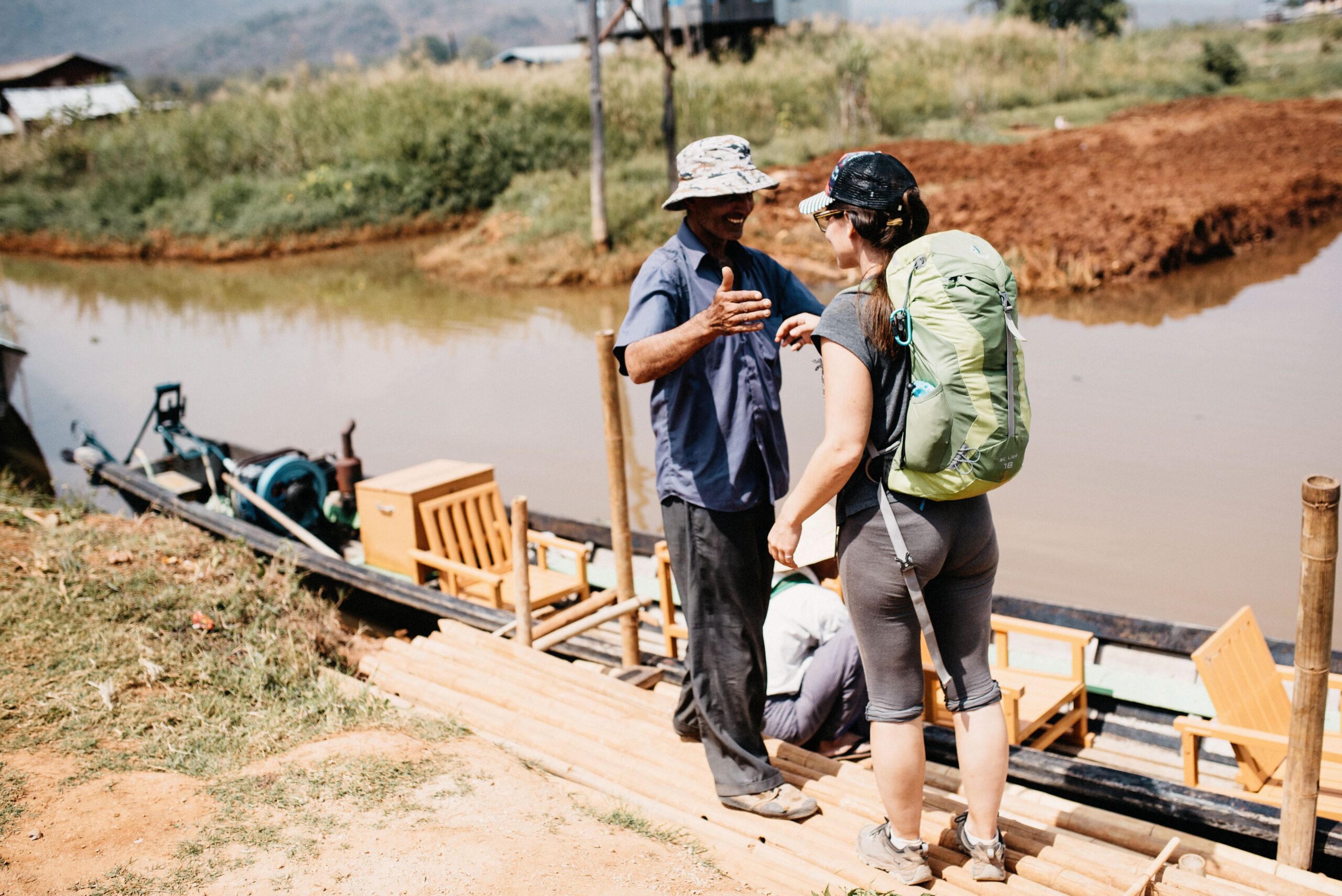 Bianca and Tom boarding the boat at the end of the trek