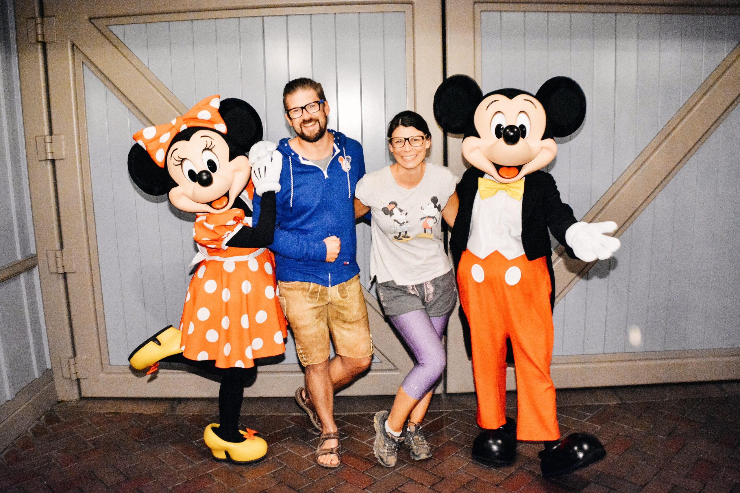 Bianca and Tom meeting Mickey and Minnie at Disneyland