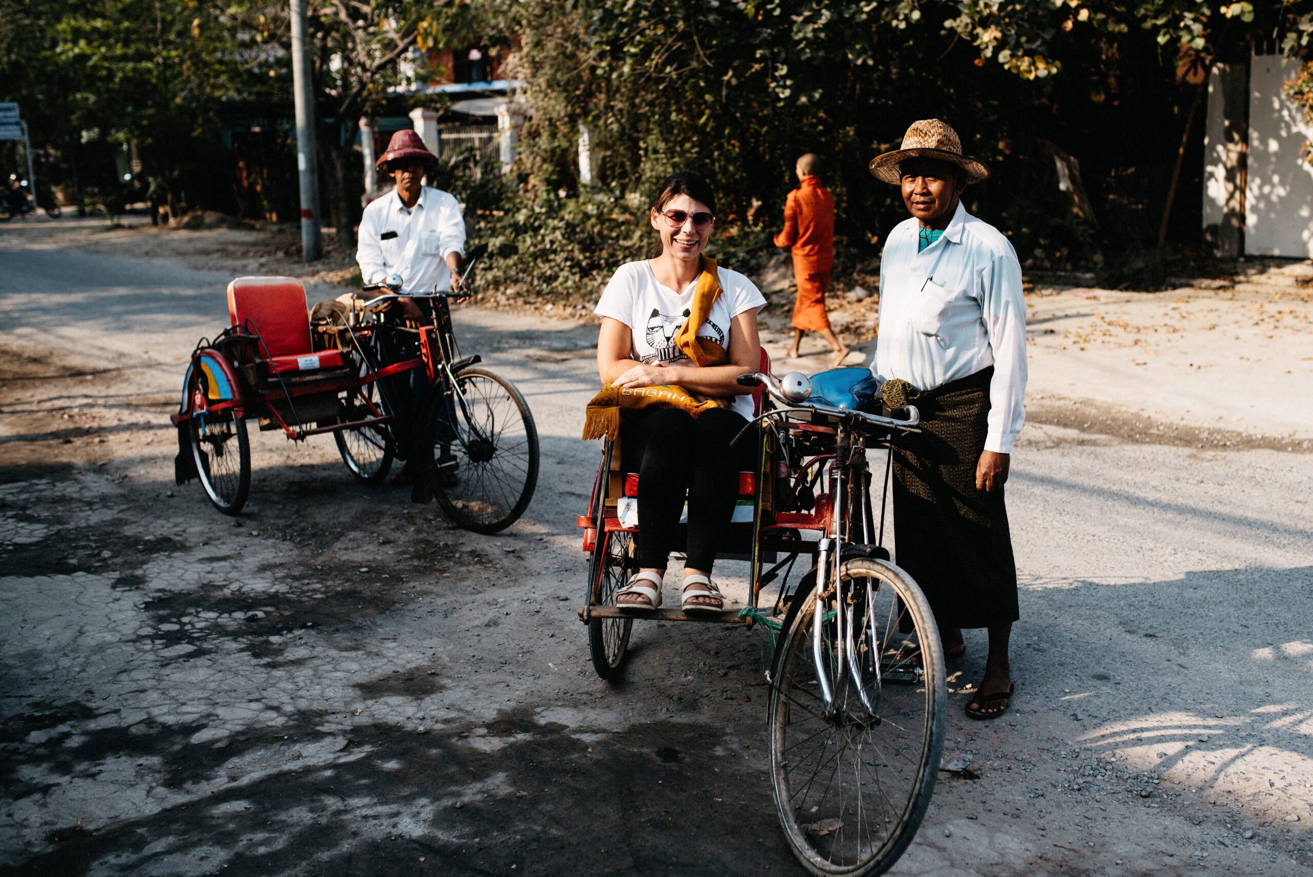 Bicycle rickshaw drivers waiting in Mandalay