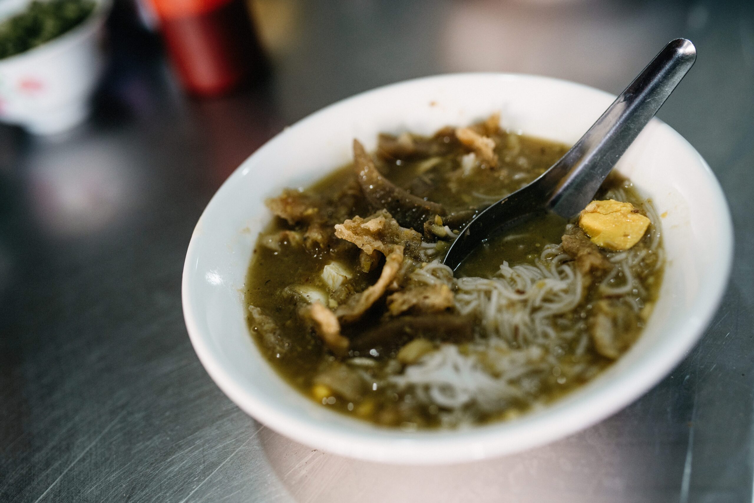 A bowl of Mohinga fish soup with noodles