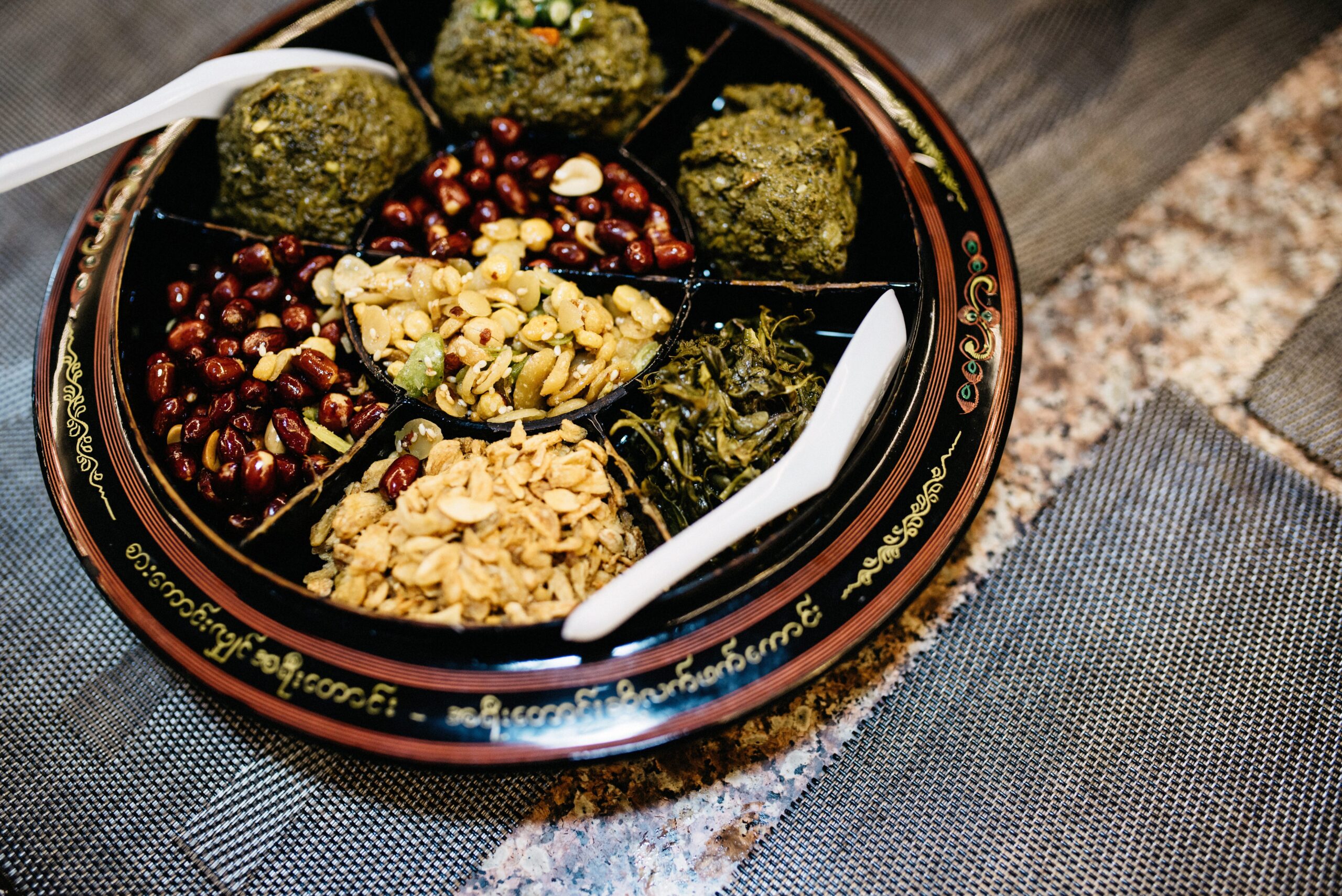 A bowl of Mandalay chilli salad with beans and nuts