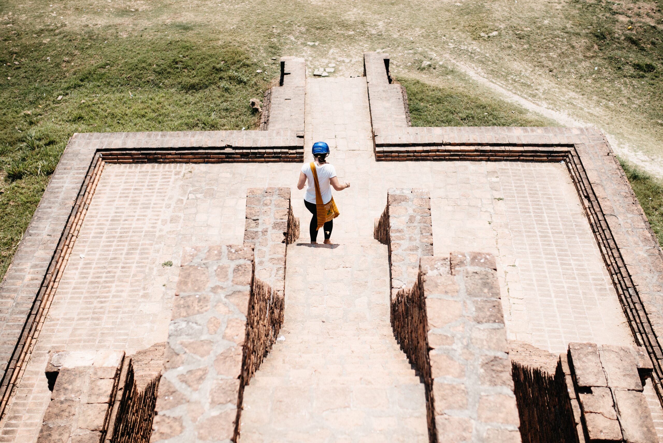 Bianca standing on the upper terrace of an old temple in Inwa
