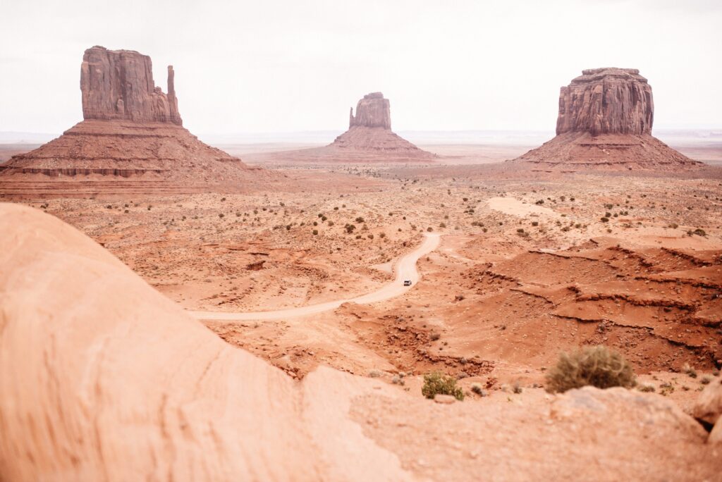 The road winding between the famous buttes of Monument Valley