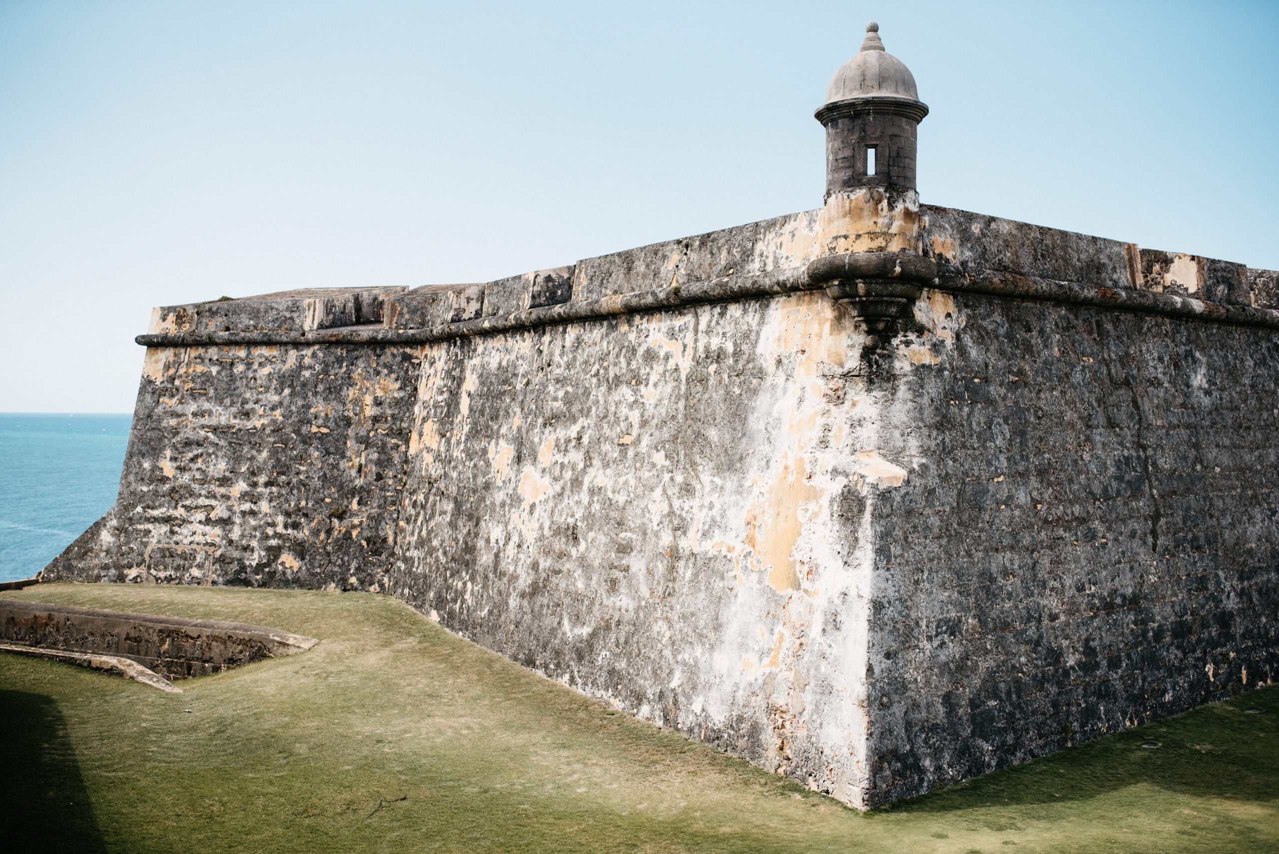 A stone watchtower and walls at Castillo San Felipe del Morro