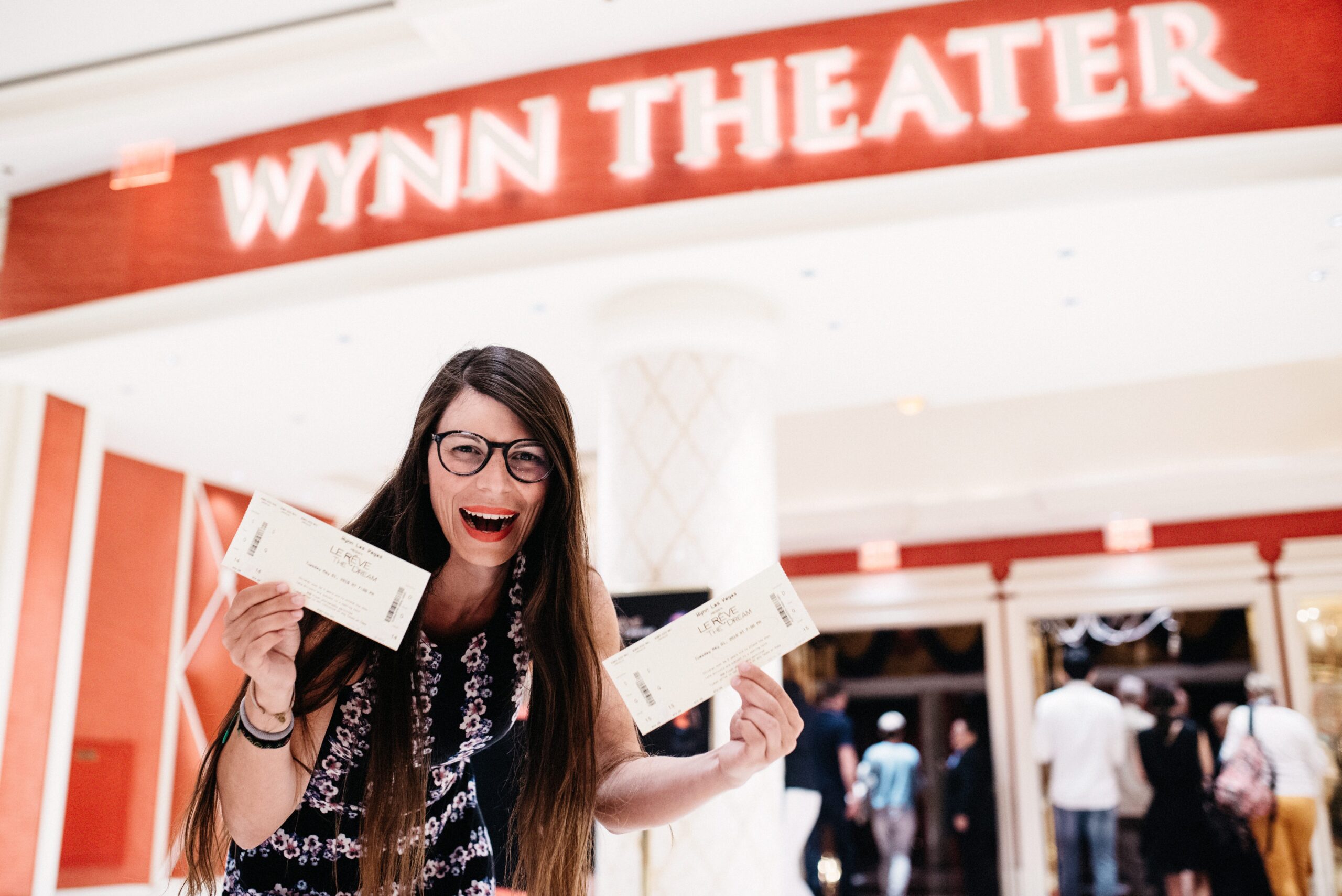 Bianca holding our Le Rêve tickets outside the Wynn theatre